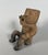 Quimbaya culture, Colombia, Central Cauca Valley. Circa 500-1500 AD. Terracotta figurine of a seated chieftain ("Cacique")...