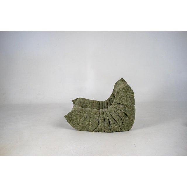 This Togo has been reupholstered with new foam and high-quality new fabric, keeping its inner structure, giving the item...