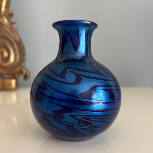 Beautiful blue iridescent petite art glass vase. Crafted in December 2008 by Jeff Howell for Orient and Flume in NE...