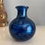 Beautiful blue iridescent petite art glass vase. Crafted in December 2008 by Jeff Howell for Orient and Flume in NE...