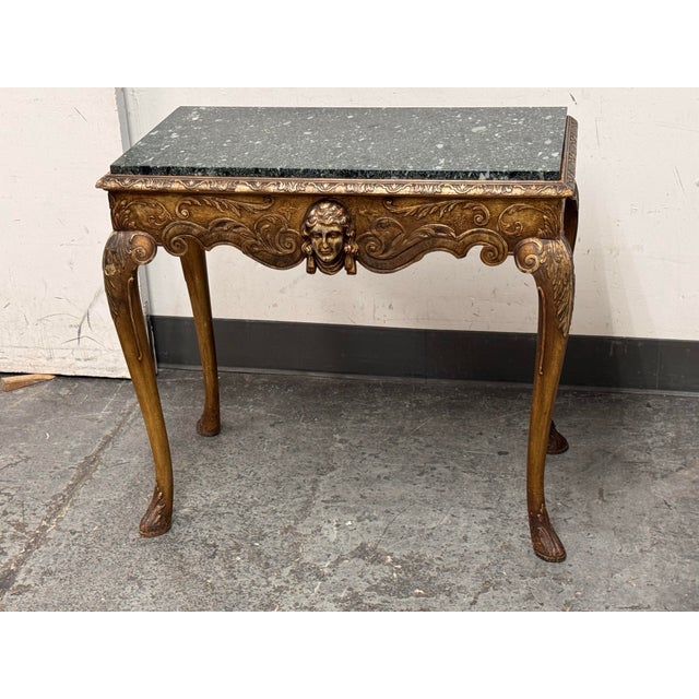 Design Plus Gallery presents an Italian Carved Giltwood Console Table + Marble Top, 19th Century. This antique console...