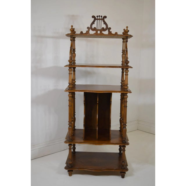 19th-Century French Music Stand made of walnut. "Lyre" removable top crest. Turned finial on the corners. Turned...