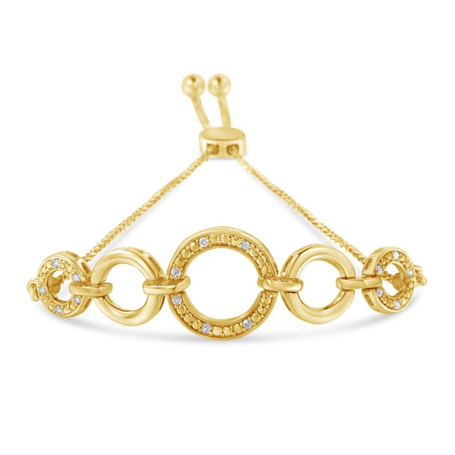 Elegant and timeless, this gorgeous .925 sterling silver bolo bracelet features a series of five graduated open circles...