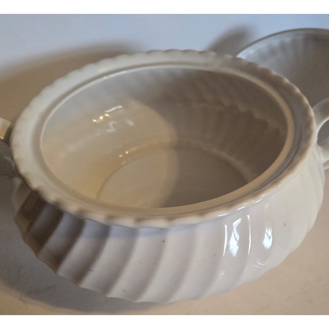 This is the "good" white ironstone. It has an ever so faint blue tint to the edges that comes with good quality vintage...