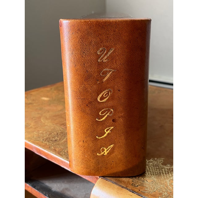 Small profile, Cherry side table / Coffee table. Louie XV revival; table top shaped like a book, featuring gold tooled /...