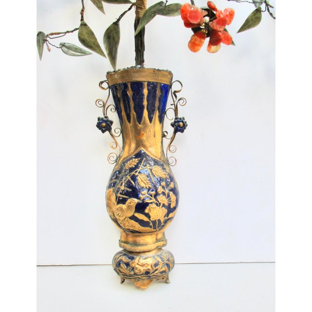 Antique enameled wall vase pair with deep navy enamel and gilt floral with birds design, Terrific quality vases. Precious...