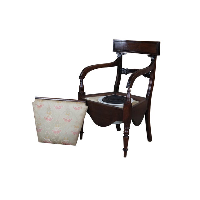 An impressive Early 19th Century Regency Era Commode with Chamber Pot, circa 1820s. Features a mahogany frame with...