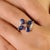 This elegant ring features 4 pear-cut blue sapphire totaling 1.58 carats, set in 14K white gold. Each gemstone measures...