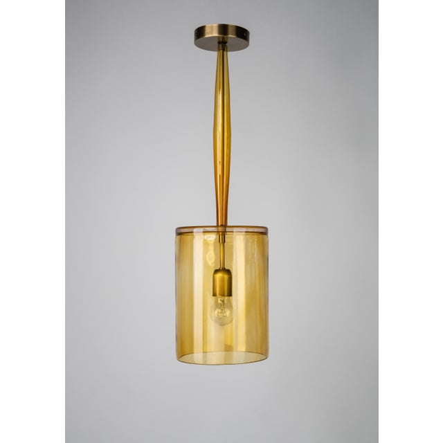 Contemporary style Pendant, Ebony, Dark oxidised and lacquered brass, Topaz Hand crafted glass, D200xH615mm, 1xE27 This...