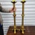 Pair of 24'' high quality gold gilt over brass candlesticks with exceptional detailing featuring a cross on the base. This...