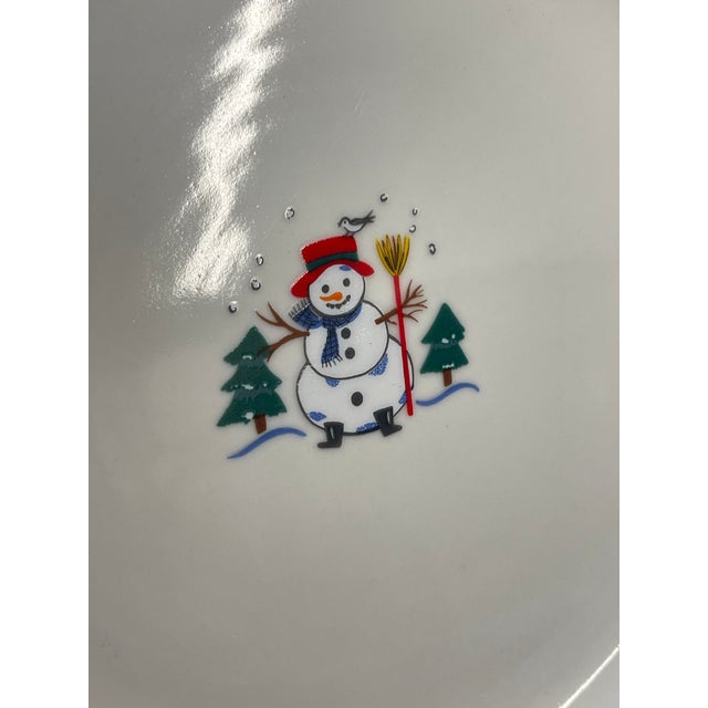Snow Village by Pfaltzgraff - this Christmas themed dinner plate features a whimsical winter village motif, showcasing a...