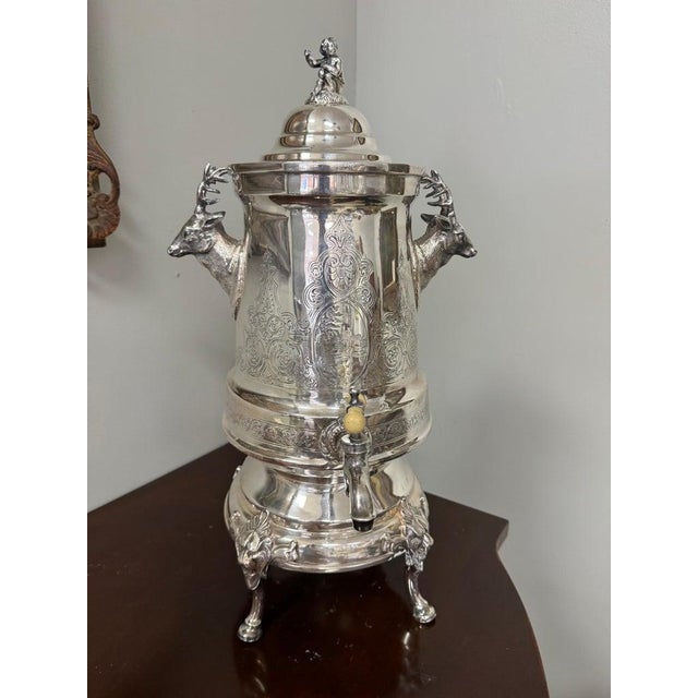 Beautiful vintage silver-plated coffee and tea urn with exceptional decorative details. The cylindrical body features...