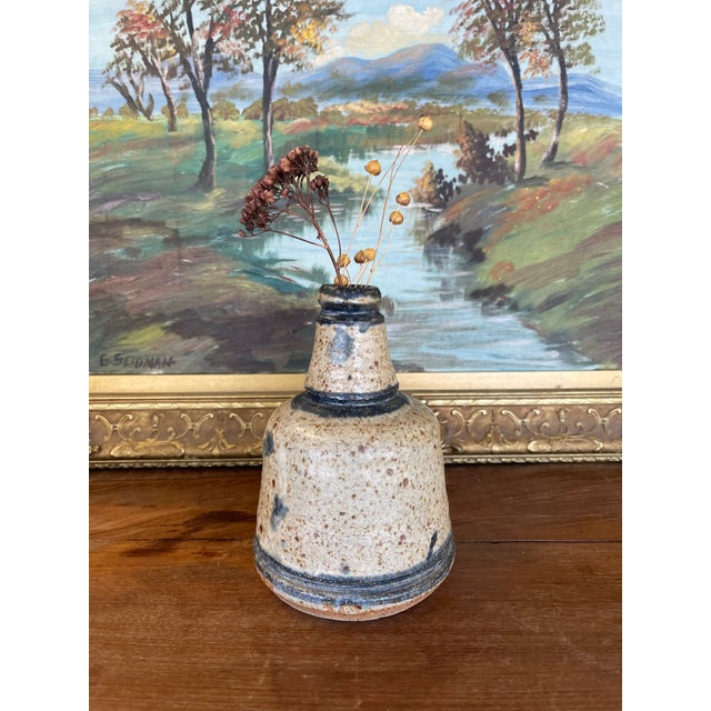A distinctive example of 20th-century American studio pottery, this hand-thrown stoneware vase is signed “MATAY” on the...