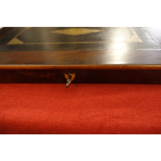 Large 19th-century writing desk two-tone mahogany leather-bound with gilt decoration paper interior pen and inkwell...