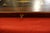 Large 19th-century writing desk two-tone mahogany leather-bound with gilt decoration paper interior pen and inkwell...