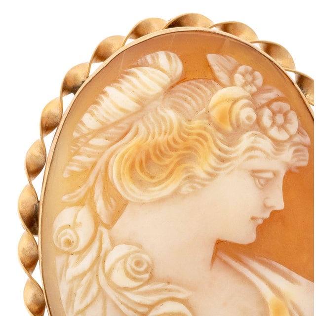 Vintage Carved Shell Cameo and 14K Yellow Gold Brooch Pendant, designed as a classical profile of a maiden with floral...