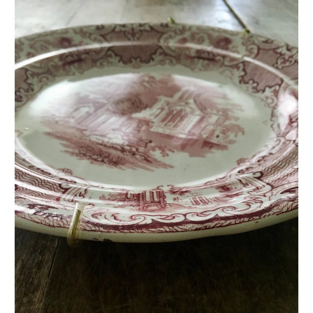 Made by George Jones and Sons, circa 1890, this pink pattern bordered in crimson against off white background transfer...