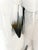 Plumage and Obsidian Kristen Leigh Baker | 2025 Medium: Ethically sourced hand selected feathers, driftwood and hand-...