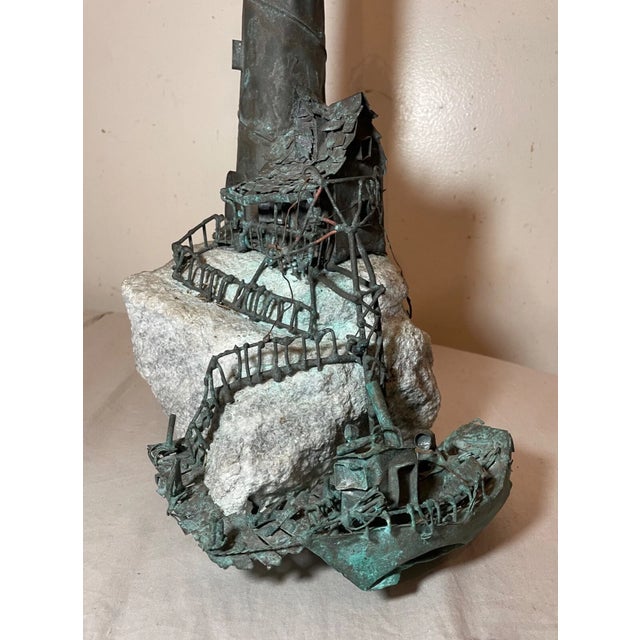 Experience the raw beauty of nautical life with this striking bronze sculpture, expertly crafted by artist Jim Lewk. This...