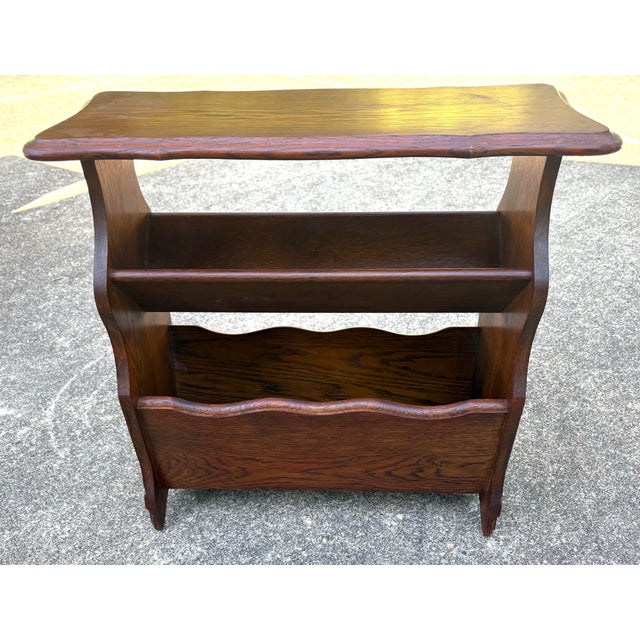 Nice vintage French wood book trough table with Fleur de lis design on sides!