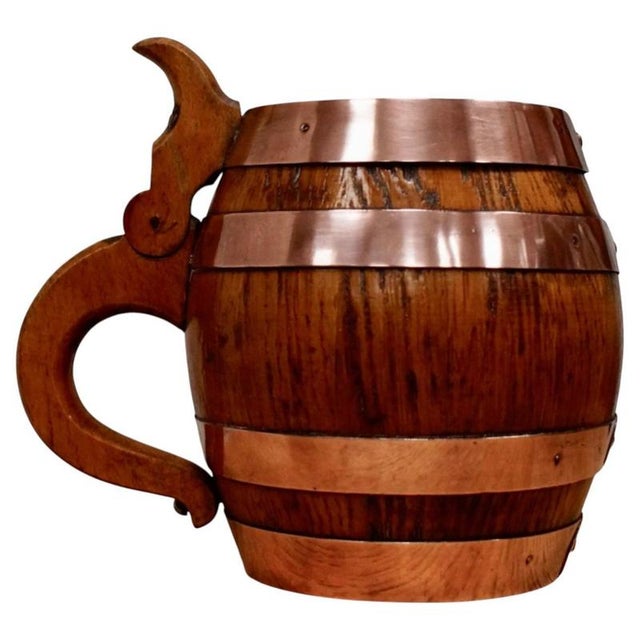 Antique Oak Barrel-Form Beer Stein, circa 1890 Material: Oak, Copper A characterful late 19th-century beer stein fashioned...