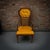 A striking mid-century armchair featuring a sculptural wood frame, high-profile cane back, and original mustard-gold...