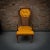 A striking mid-century armchair featuring a sculptural wood frame, high-profile cane back, and original mustard-gold...