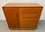 Exceptional vintage Mid-Century Modern teak gentleman’s chest by The Sun Cabinet Co. Ltd., showcasing the rich warmth and...