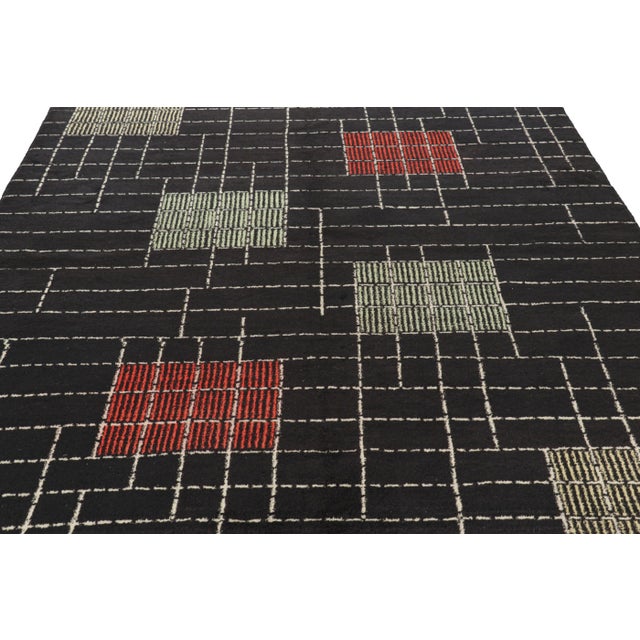 Made with hand-knotted wool circa 1960-1970, this 7x10 vintage rug from Turkey is believed to be the work of mid-century...