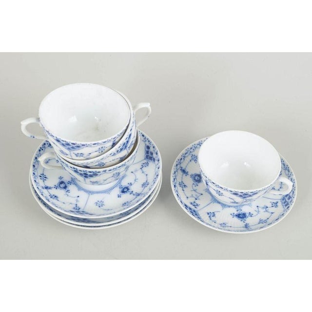 Royal Copenhagen blue fluted half lace Set of 4 chocolate cups with matching saucers. Classic Blue Fluted Half Lace cups...
