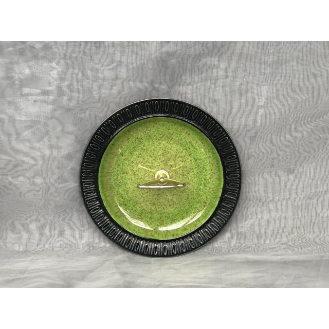 Display this vintage Red Wing pottery tidbit dish as decor on a modern coffee table or dining room sideboard, or use it as...