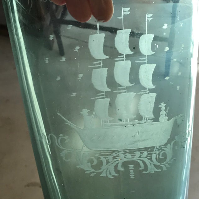 Recycled glass from Coke bottles made in Mexico. Etched glass shows a hand etched schooner ship with waes along the top...