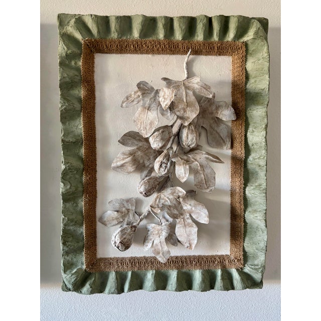 Celebrate organic beauty with this unique wall sculpture, featuring fig branches and leaves crafted in layered paper mache...