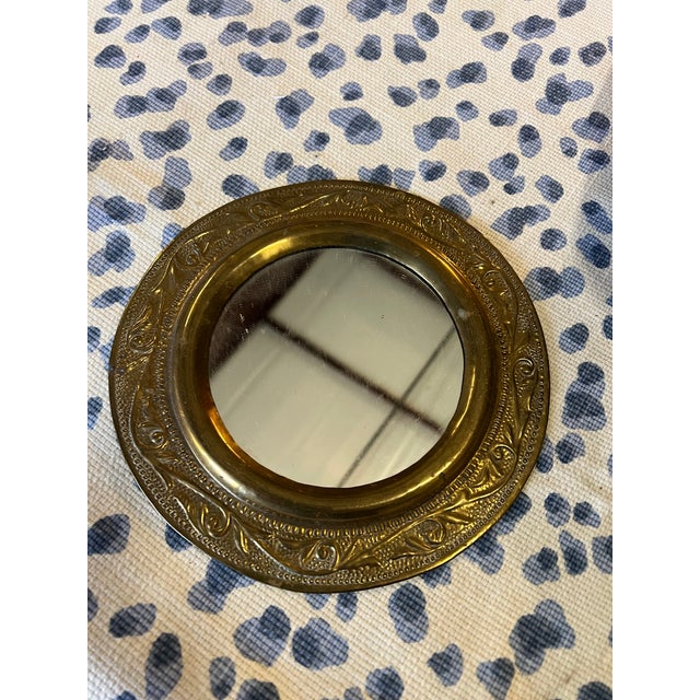 Up for consideration is a beautiful vintage brass edge petite mirror. This would look lovely in your home and it is a...
