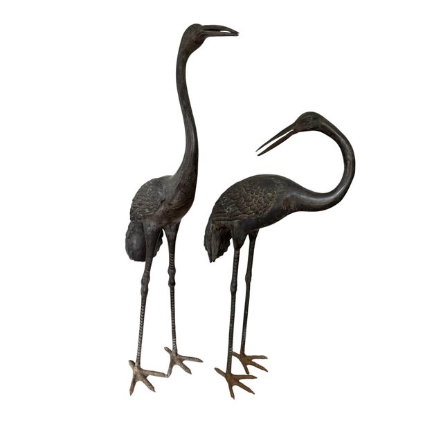 This is a wonderful pair of well delineated cranes for the garden. The cranes appear to be composed of cast bronze, and we...