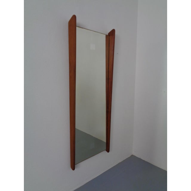 Large mirror with a solid teak frame by Uno & Östen Kristiansson for Luxus from the 1960s. I have official proof of...