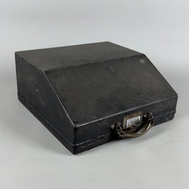 A historic italian portable typewriter, produced by the renowned s.a. Serio of milan. This is the everest mod. 90, an...