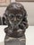 This bronze bust of a child at rest isn’t trying to be fancy or dramatic. This bronze has that beautiful, dark glow that...