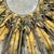 Vintage French Sunburst Gilt Metal Wall Mirror. Mirror features gold leaf paint on a metal frame with alternating lengths...