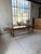 Antique dining table from the first half of the 20th century, crafted from solid walnut. Inspired by drapery designs, with...