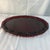 Offered here is a vintage ruby red glass oval serving platter, from the Avon 1876 Cape Cod collection.