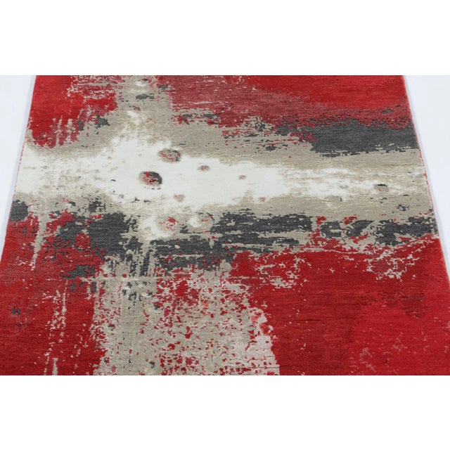 Hand-knotted in a luxurious blend of wool and silk, this 3x8 rug from Rug & Kilim’s Modern collection represents a...