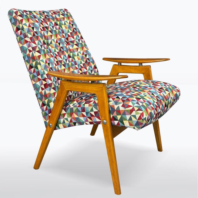 Period: 1960s, design: ing. Jaroslav Šmídek, material: solid beech, upholstery. The chairs are restored and also newly...