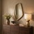 Cast aluminum construction gives the Bardot Metal Table Lamp it's organic shape and sculptural presence. Drawing...