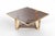 Vintage Brass and Fumé Glass Coffee Table. Italian production, 1970s. An elegant and architecturally conceived Italian...
