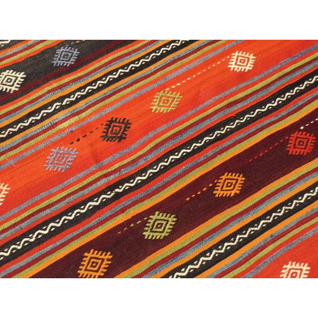 This beautiful, vintage, handwoven kilim is approximately 60 years old. It is handmade, of very fine quality hand spun...