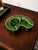Offering a distinctive circa 1940s–1950s ceramic advertising ashtray from Lamer Hotels, a historic Kansas hotel group with...