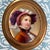 This is a beautiful antique portrait of a woman that has been painted on a porcelain blank and framed in a gold-tone metal...