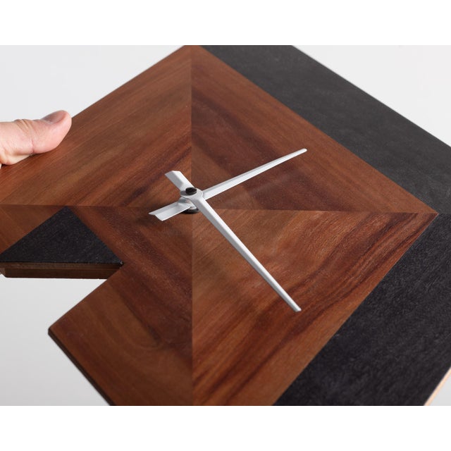 Pendulum clock with high quality quartz machine. Produced in original design creating a 3D illusion.Made of coloured plum...