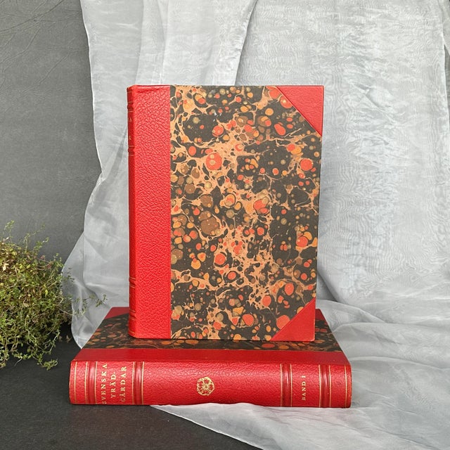 This impressive vintage book set has hand-marbled paper over hardcover book boards and quarter leather bindings. The fully...